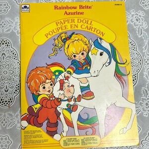 1984 Hallmark Golden Rainbow Brite paper doll book. See photos.